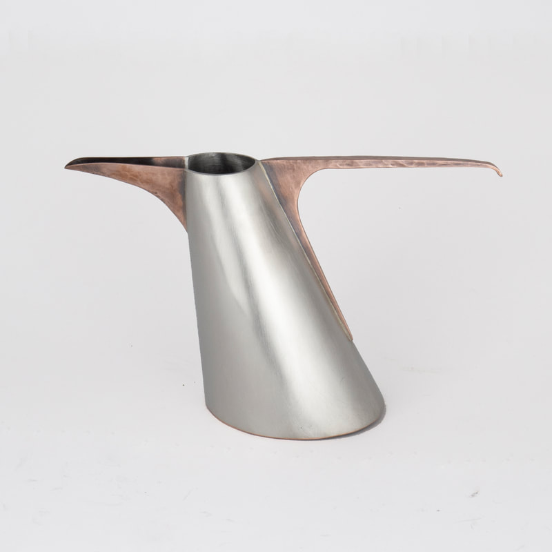 Pewter and copper watering can